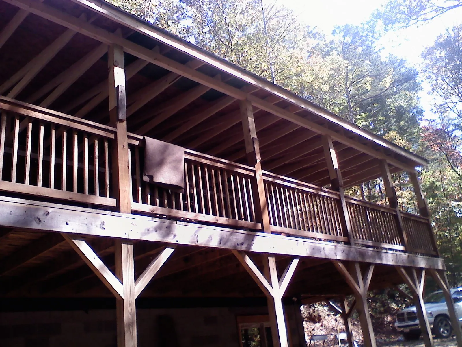 Timber framing under a new elevated porch and deck — Roof Leak Repair in Snowmass Village by Roofing Brothers